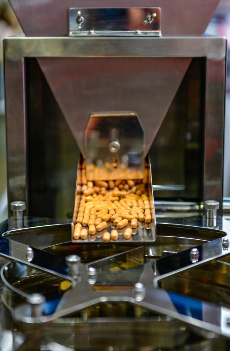 medium-vecteezy_rotary-capsule-counter-and-packaging-machinery-line-in_82607925_medium